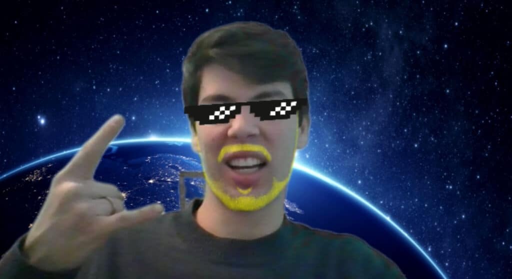 A user using the Zoom Studio Effects filters to add sunglasses and a yellow beard. 